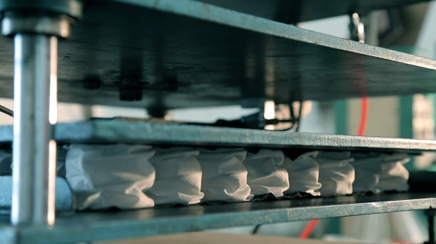 Pocketed coil spring resilience test